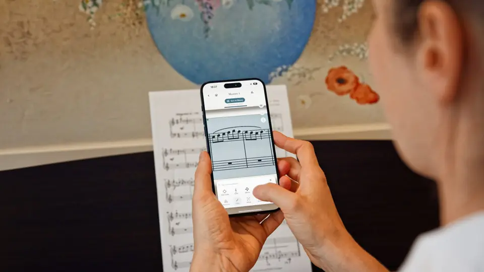 Point your camera at a bar of printed music and the note names appear